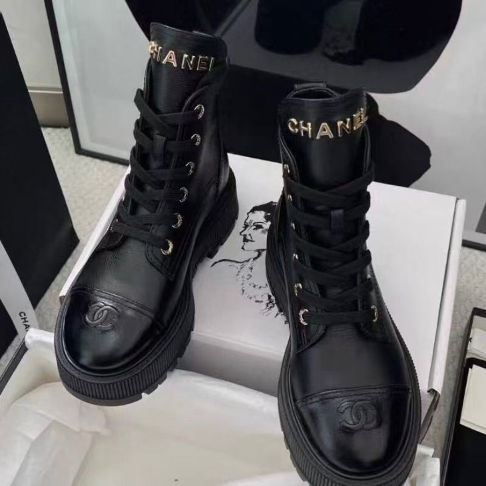 CHANEL Black Leather Lace-Up Combat Boots with Gold Logo